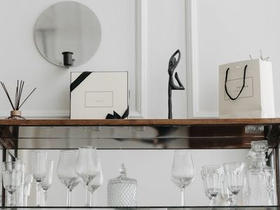 Minimalist decor items on a shelf for peace